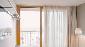 Suite (Factory) | In-room safe, desk, blackout drapes, iron/ironing board