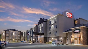 A hotel with multiple buildings, including a Best Western Plus sign, a Trendz property, and a Marriott sign. - Best Western Plus Dartmouth Hotel & Suites (Dartmouth)