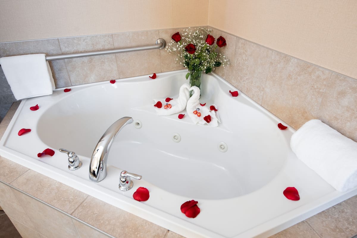 suite, 1 king bed with sofa bed, non smoking, jetted tub | pillow-top beds, desk, blackout curtains, iron/ironing board