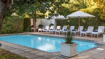 Outdoor pool, open 6:00 AM to 11:00 AM, pool umbrellas, sun loungers