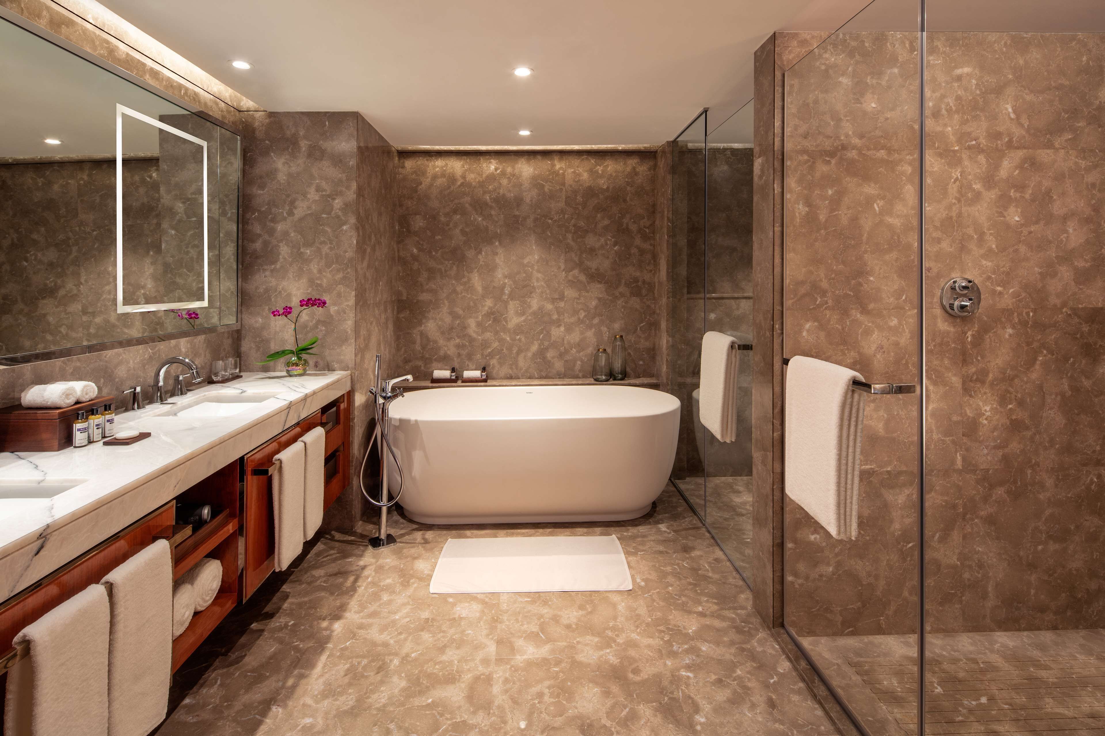 separate bathtub and shower, rainfall showerhead, free toiletries