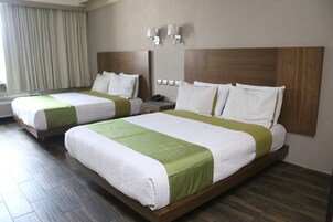 Ropa de cama de alta calidad y minibar 
