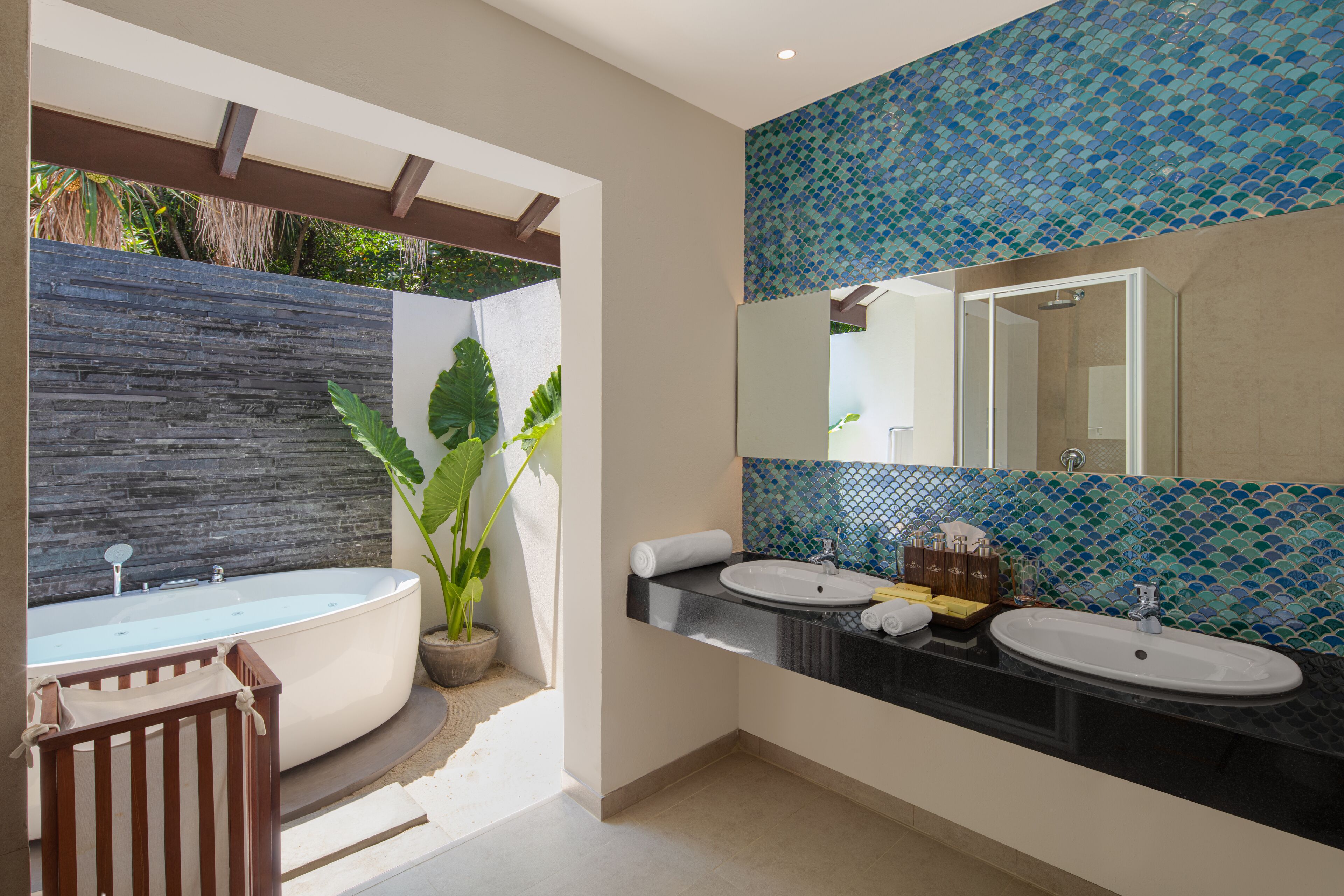 deluxe jacuzzi beach villa with premium all inclusive | bathroom | shower, free toiletries, hair dryer, slippers