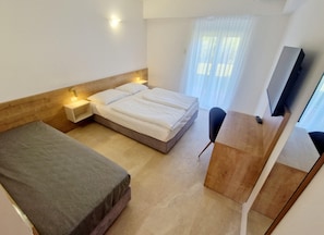 Desk, blackout curtains, free WiFi, bed sheets
