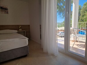 Desk, blackout curtains, free WiFi, bed sheets