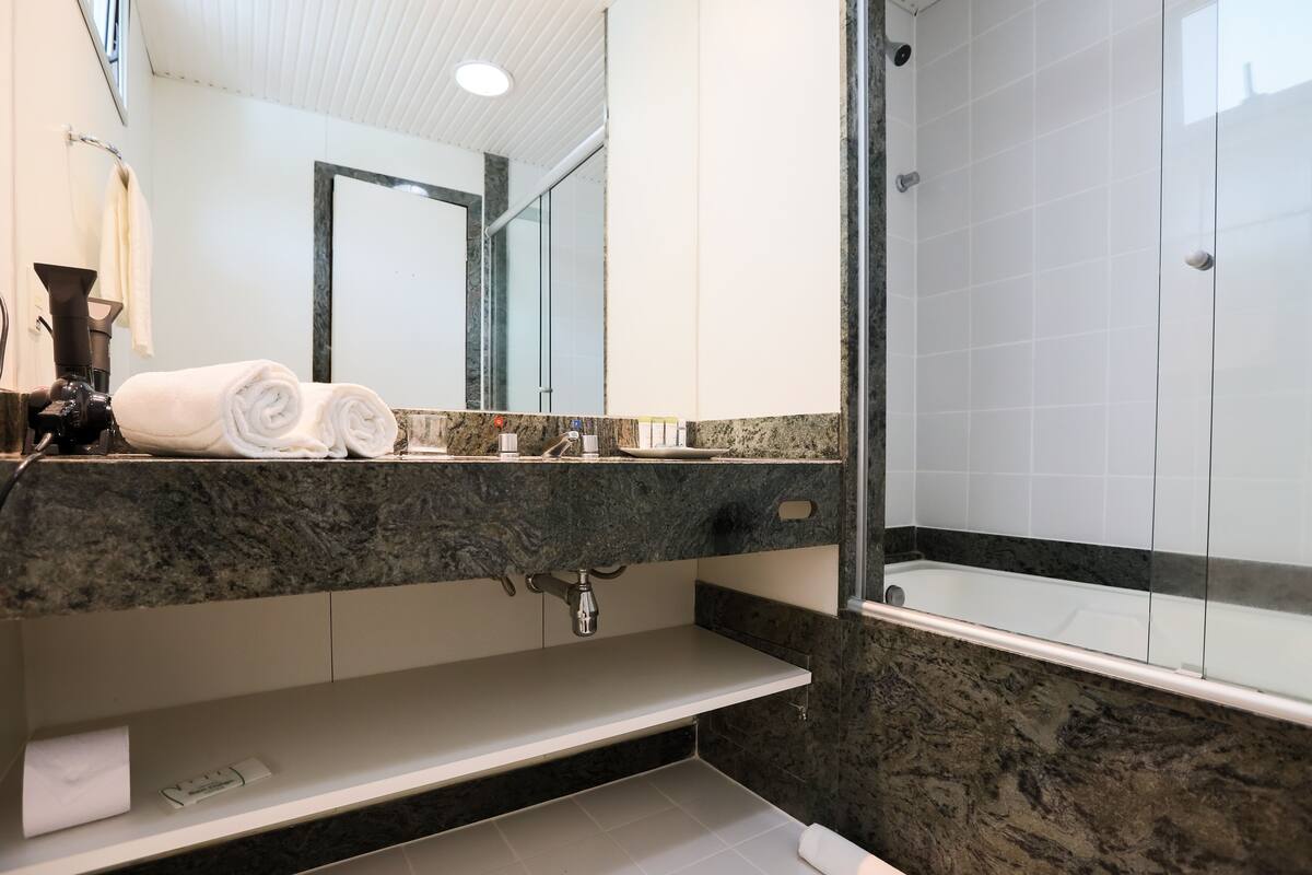 premium double room single use | bathroom | shower, free toiletries, hair dryer, towels