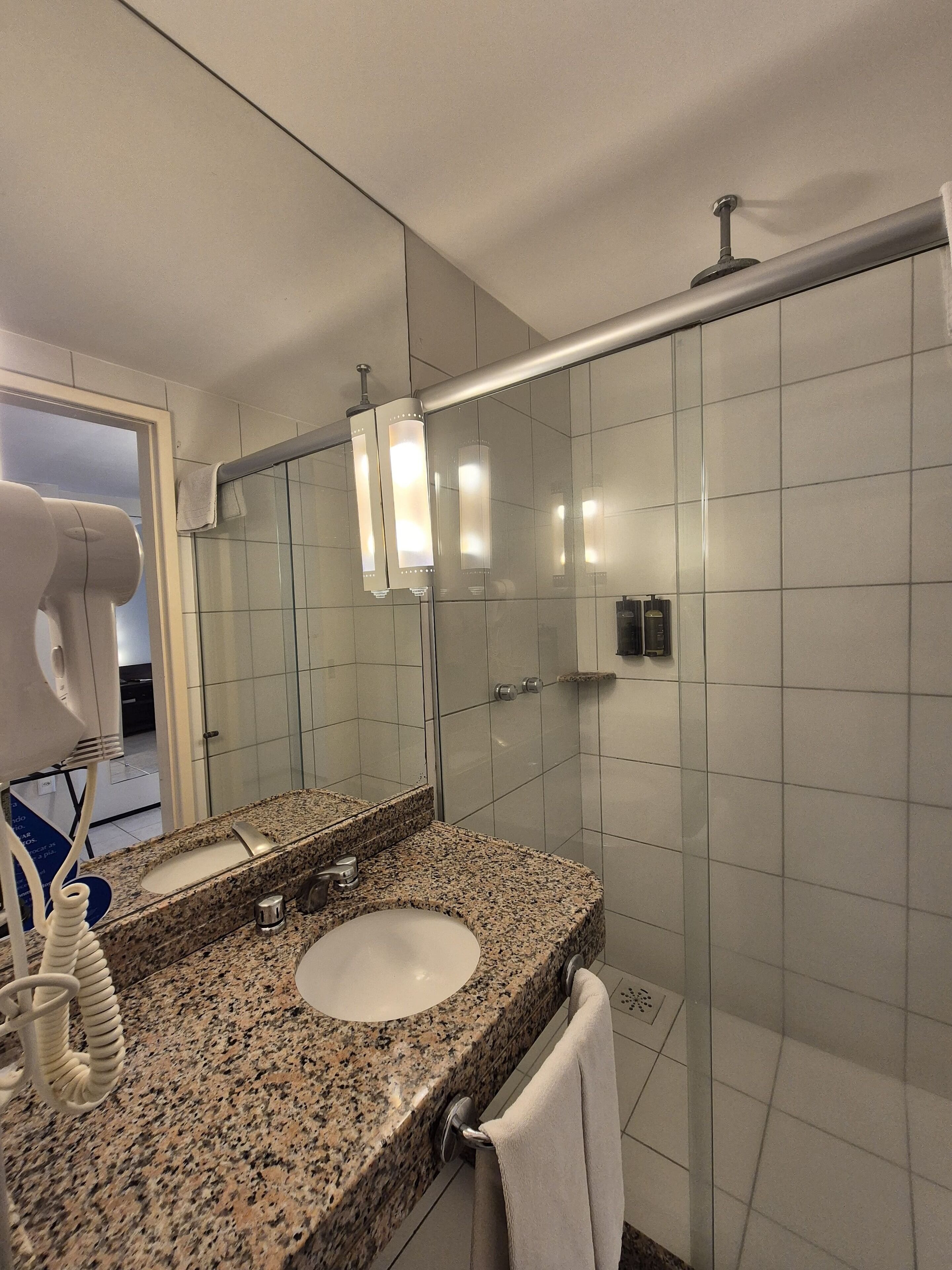 shower, free toiletries, hair dryer, towels