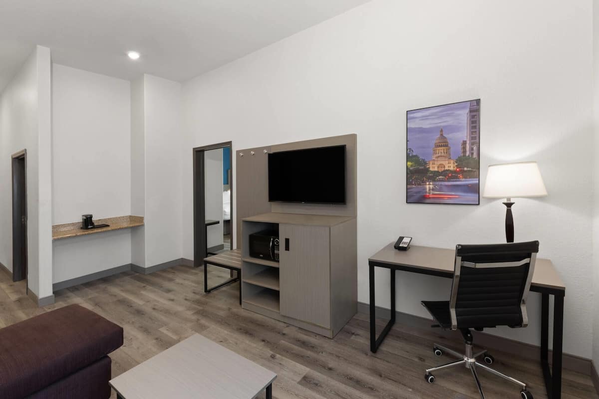 Premium bedding, desk, blackout drapes, iron/ironing board