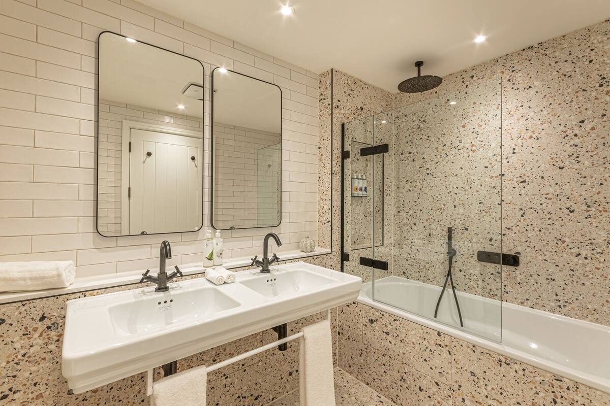 hair dryer, bathrobes, slippers, towels