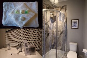 Tweepersoonskamer (The Duck) | Badkamer | Een haardroger, handdoeken
