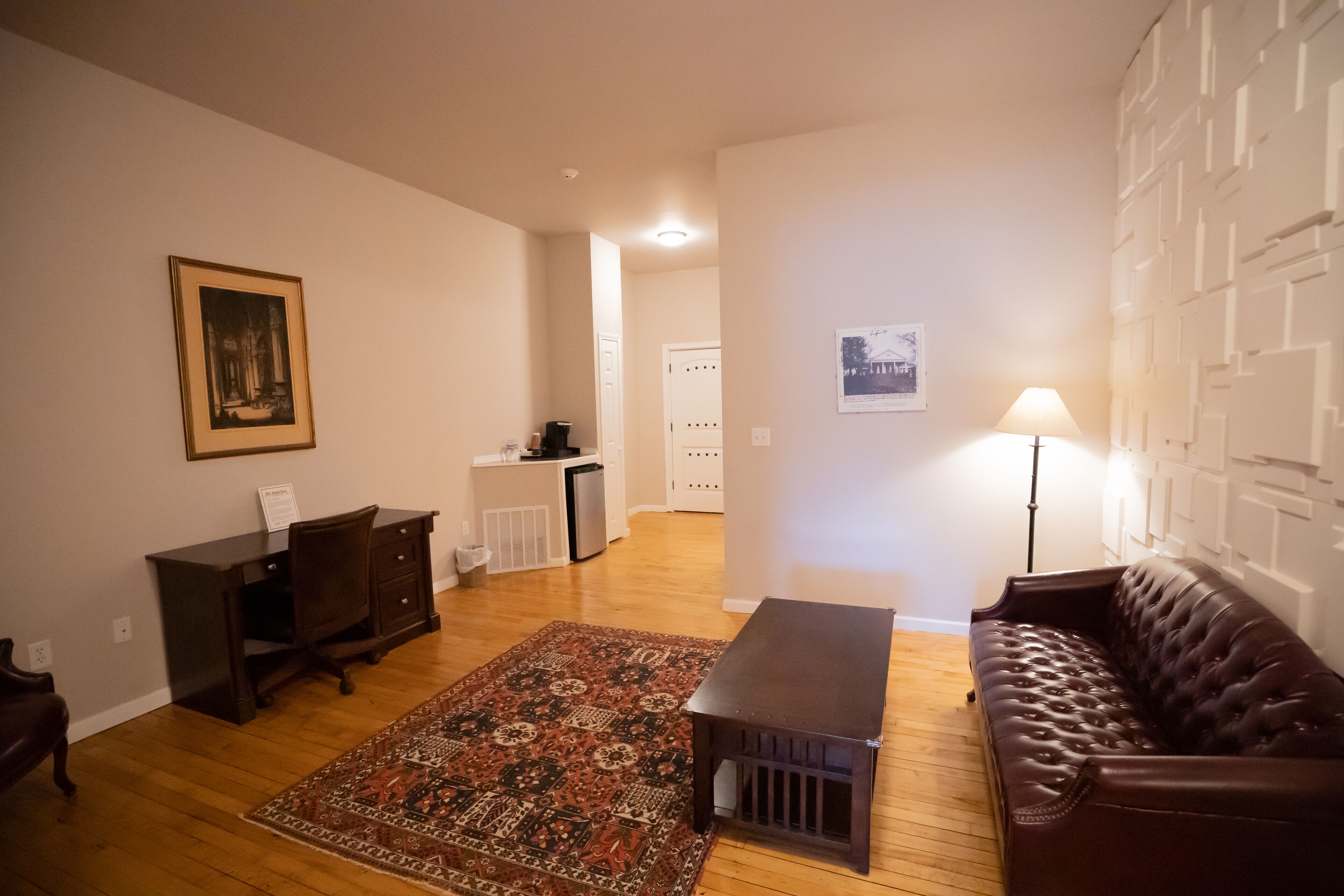 deluxe king suite | living area | 55-inch tv with cable channels