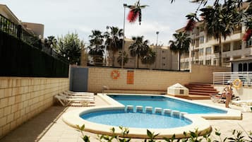 Outdoor pool, pool umbrellas, pool loungers
