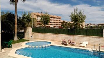 Outdoor pool, pool umbrellas, pool loungers