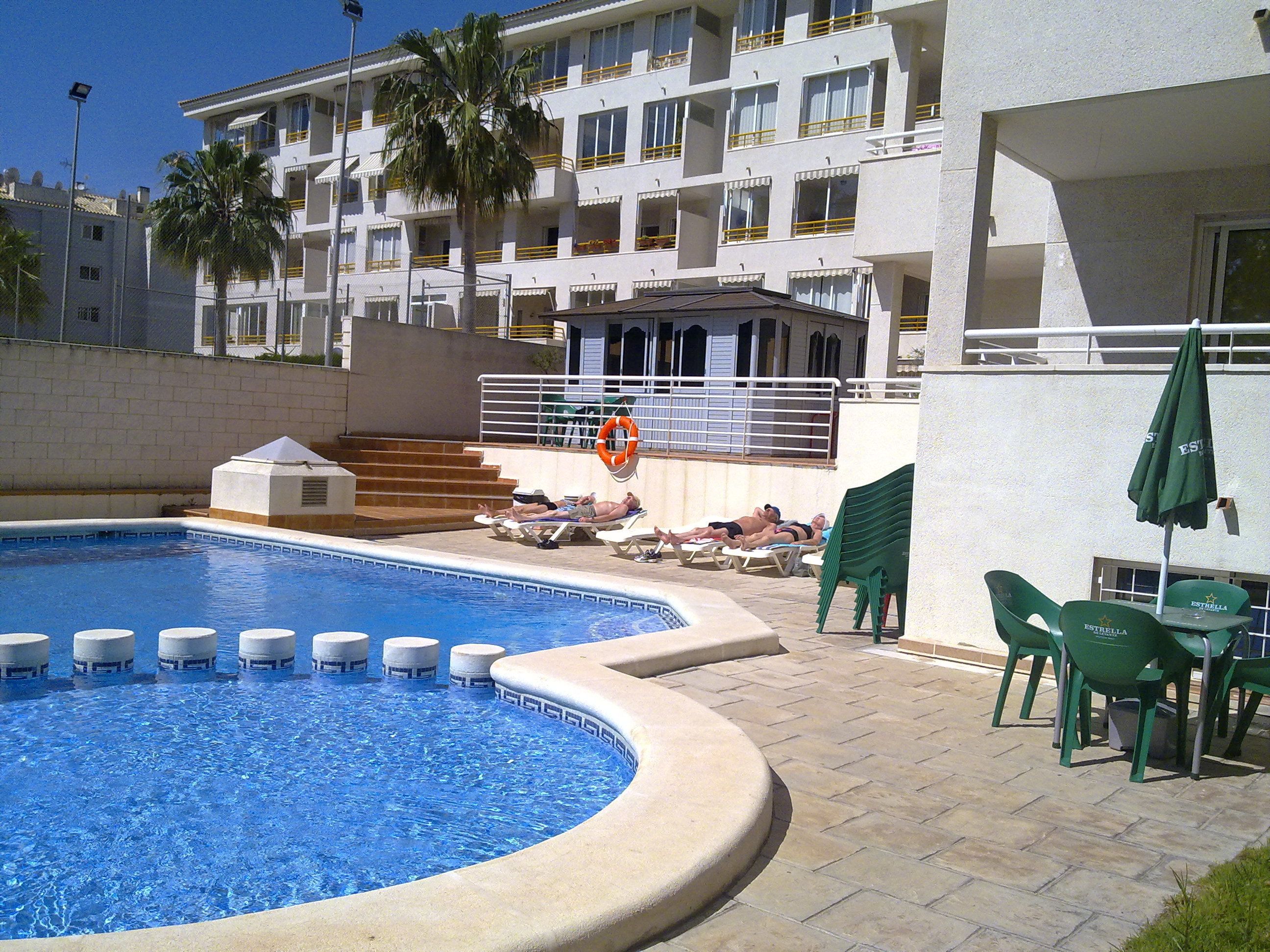 Outdoor pool, pool umbrellas, pool loungers