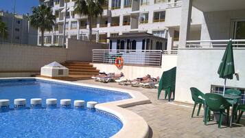 Outdoor pool, pool umbrellas, pool loungers