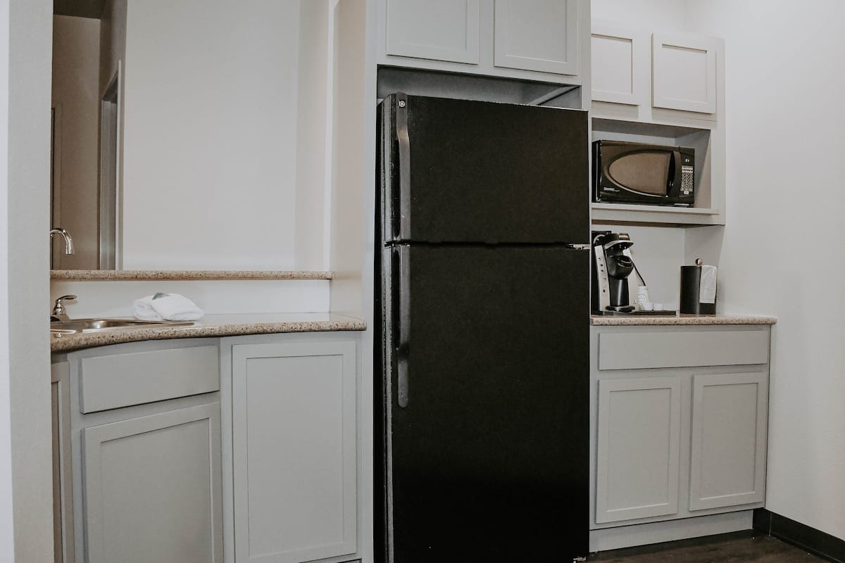 suite, multiple beds | 1 bedroom, in-room safe, desk, iron/ironing board