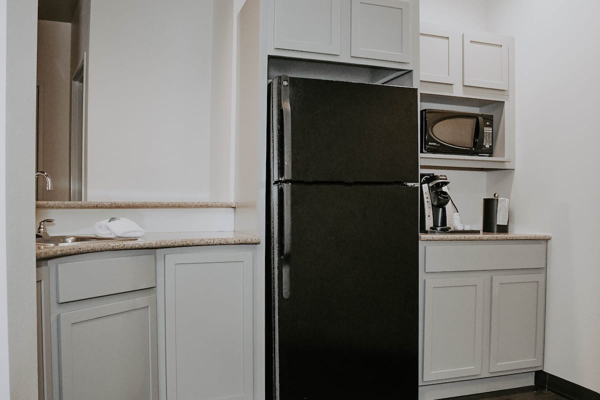 Suite, Multiple Beds | In-room safe, desk, iron/ironing board, free WiFi