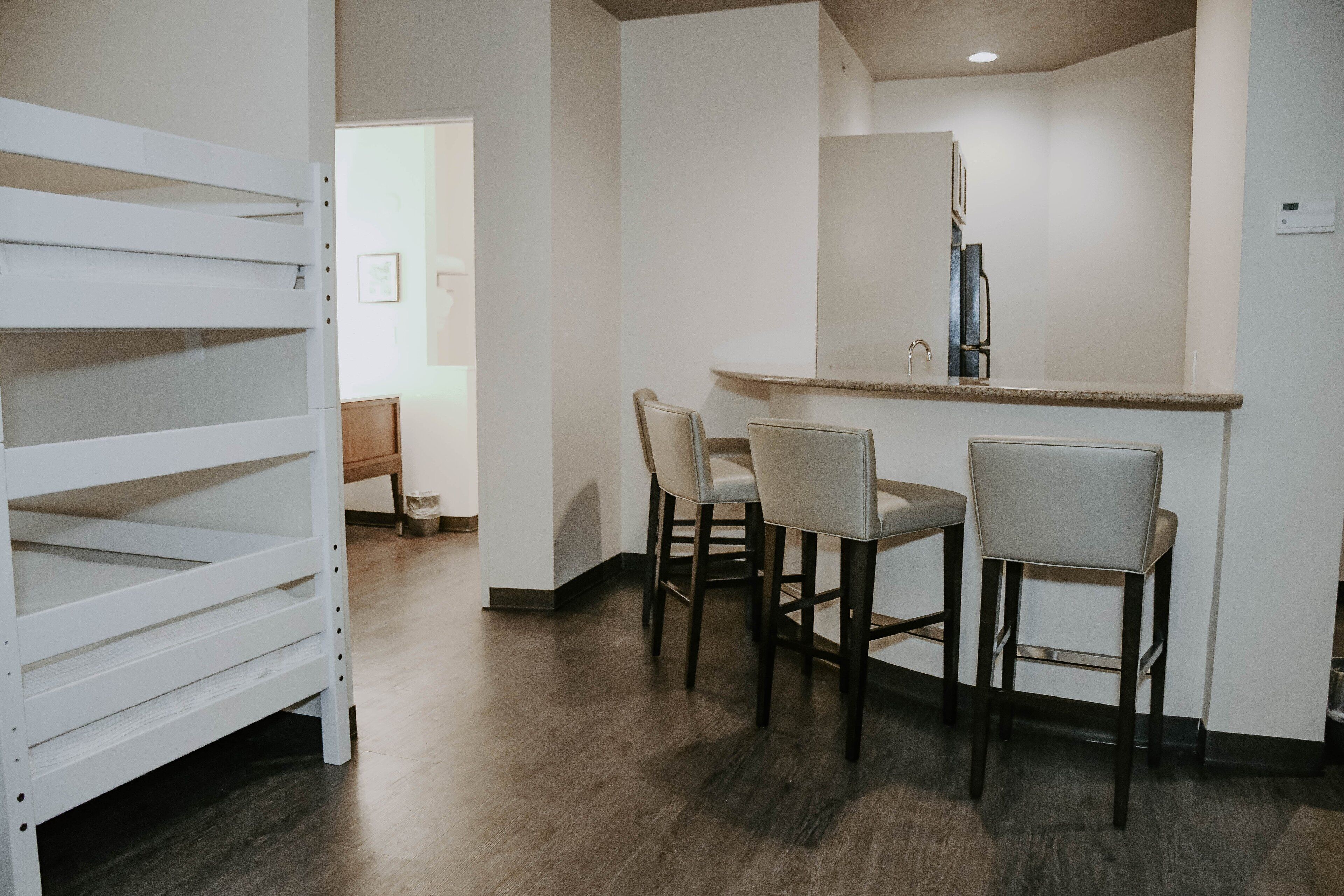 suite, multiple beds | 1 bedroom, in-room safe, desk, iron/ironing board