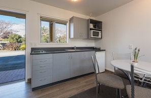 One Bedroom Apartment | Premium bedding, individually decorated, individually furnished, desk