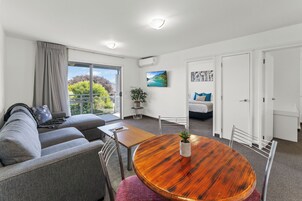 Two Bedroom Apartrment | Living area | 32-inch flat-screen TV with digital channels, TV