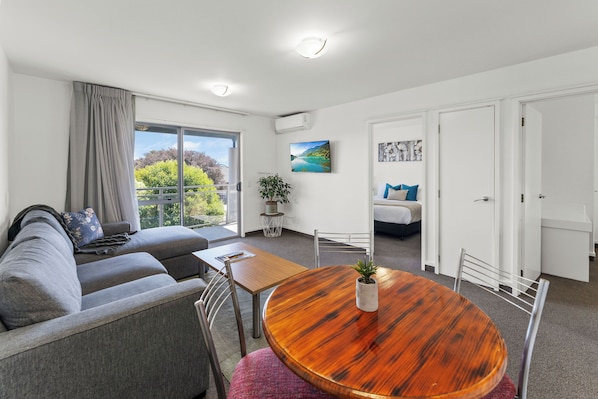 Two Bedroom Apartrment | Living area | 32-inch flat-screen TV with digital channels, TV - Greens Motel (Nelson)