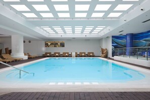 Indoor pool, outdoor pool, pool umbrellas, sun loungers