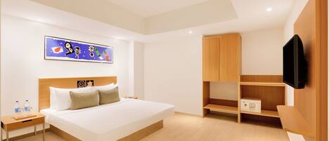A modern hotel room with a large bed, a wooden wardrobe, a television, and a painting on the wall.