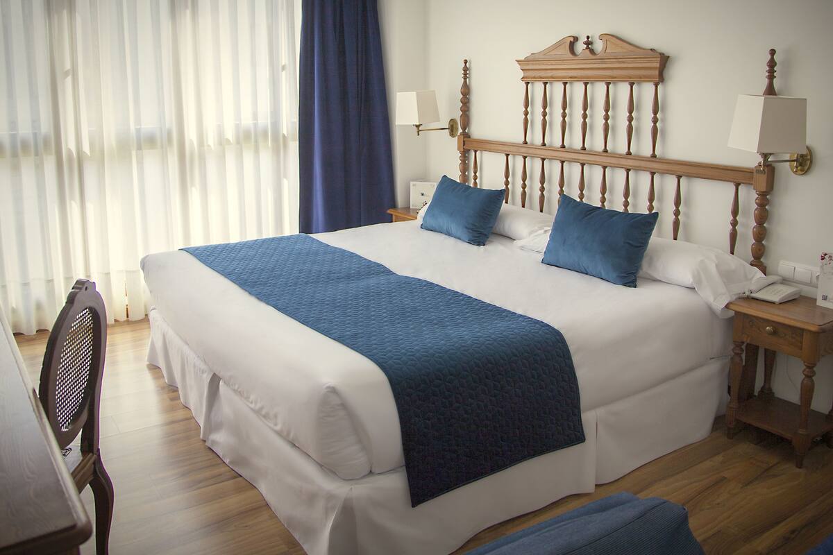 Premium bedding, minibar (some free items), in-room safe, desk