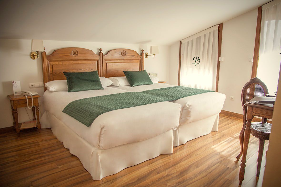 Premium bedding, free minibar items, in-room safe, desk