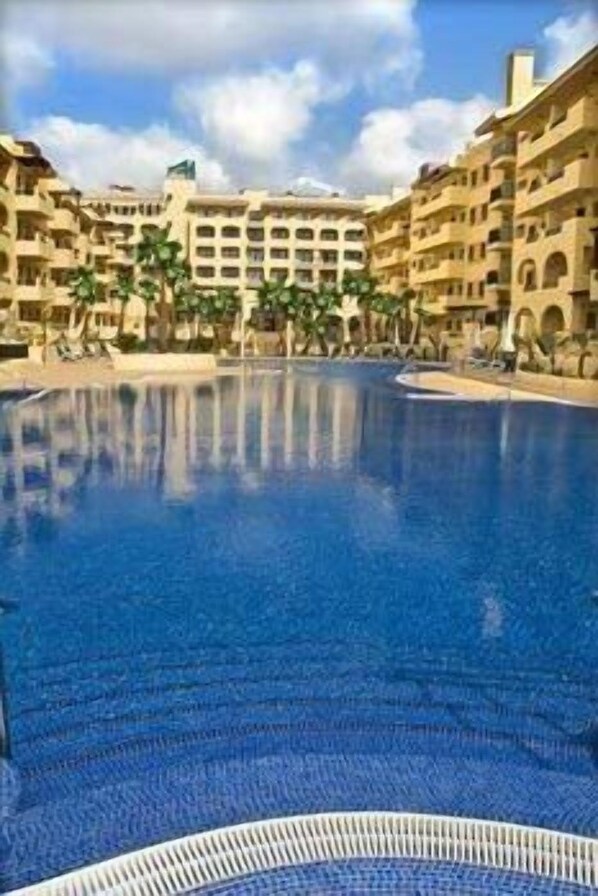 Outdoor pool, pool umbrellas, pool loungers