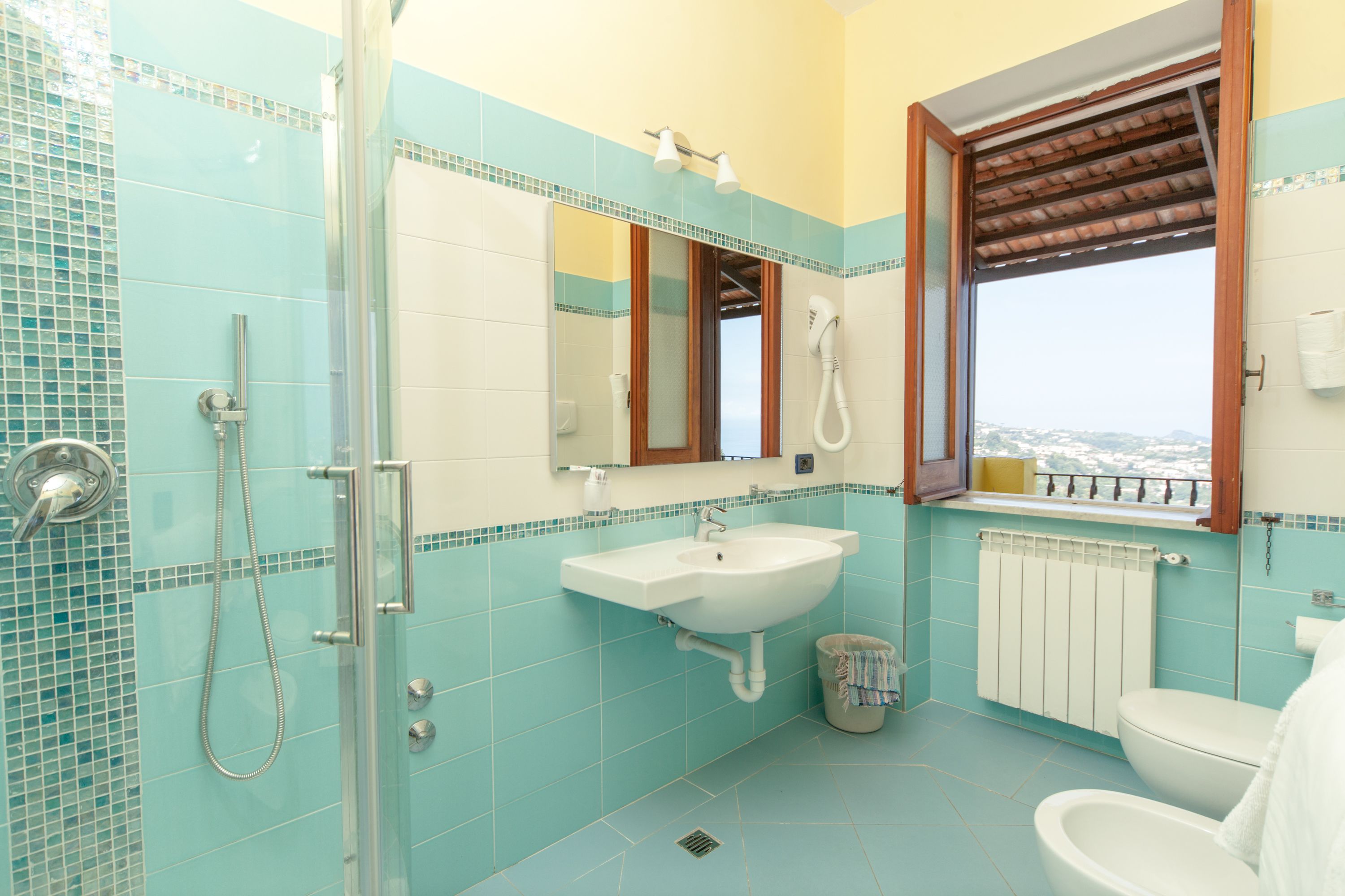 comfort double or twin room, terrace, sea view | bathroom | shower, free toiletries, hair dryer, bidet
