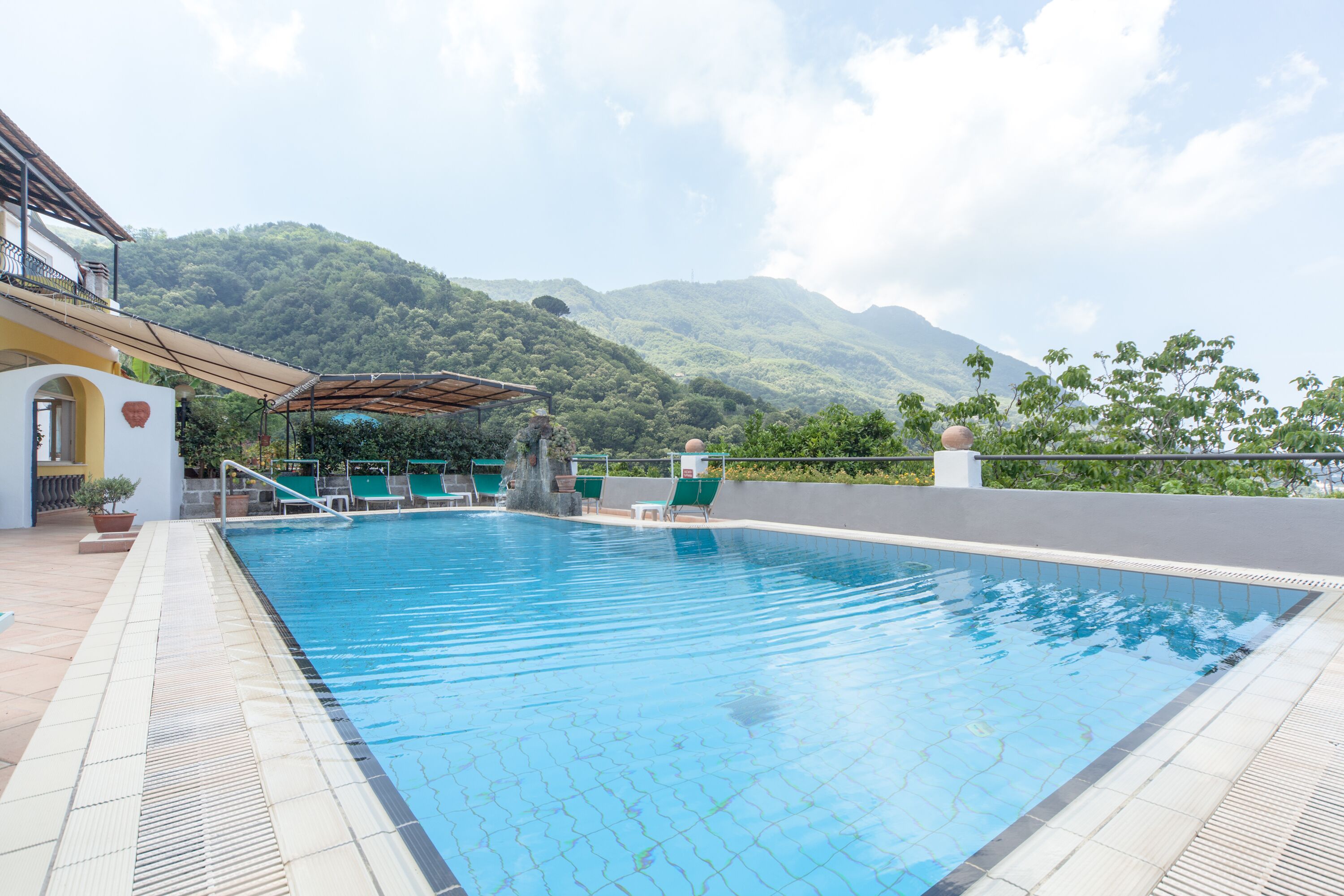 seasonal outdoor pool, pool loungers