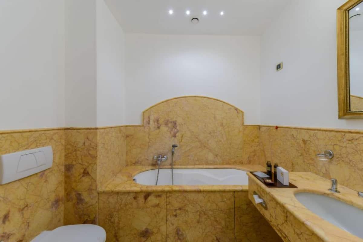 free toiletries, hair dryer, bidet, towels