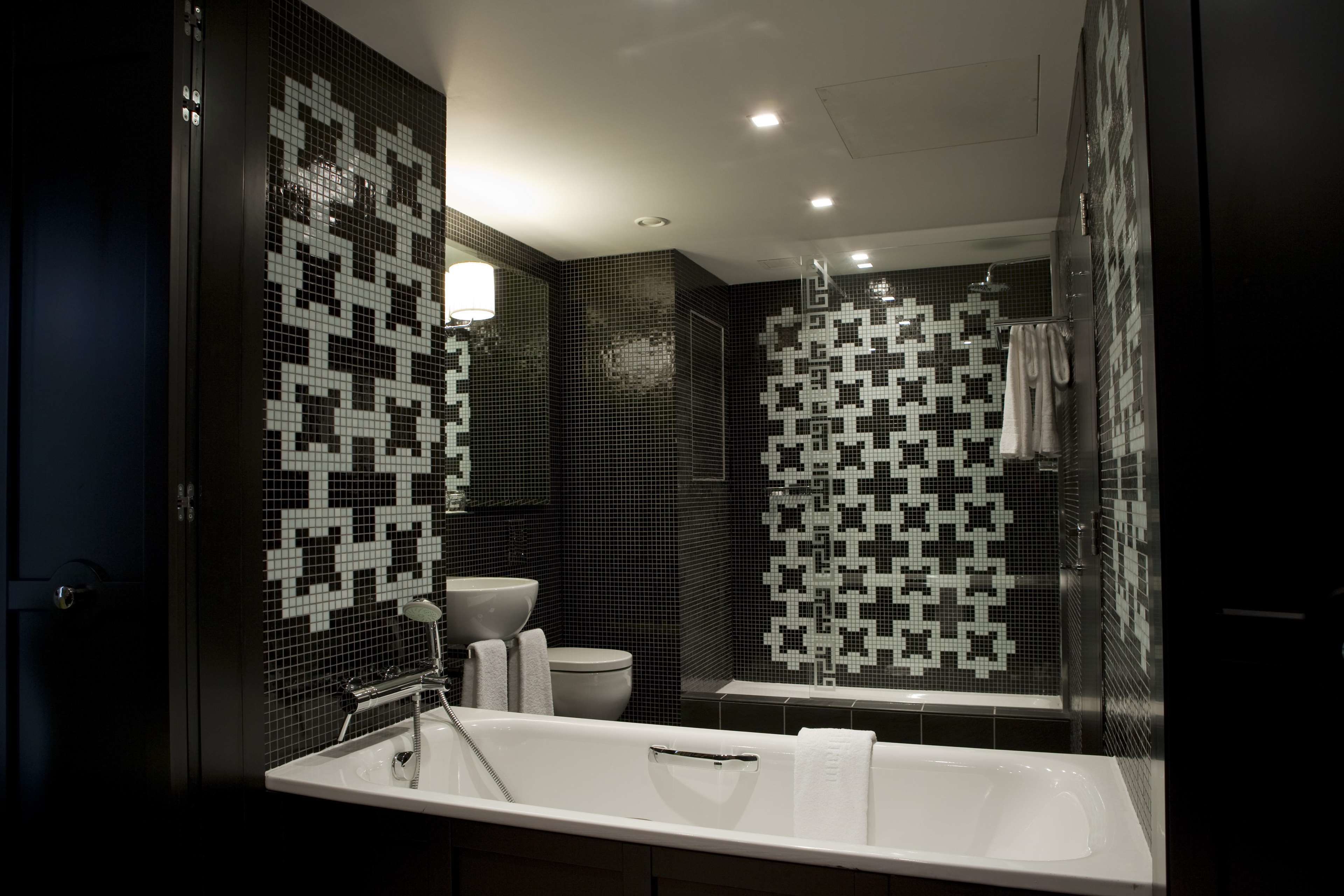 designer toiletries, hair dryer, bathrobes, slippers