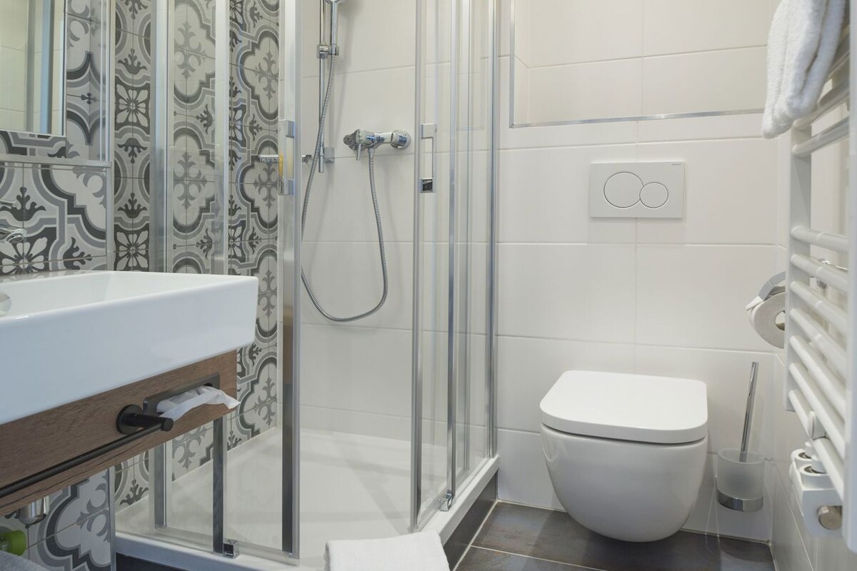 Bathroom | Shower, hair dryer, towels