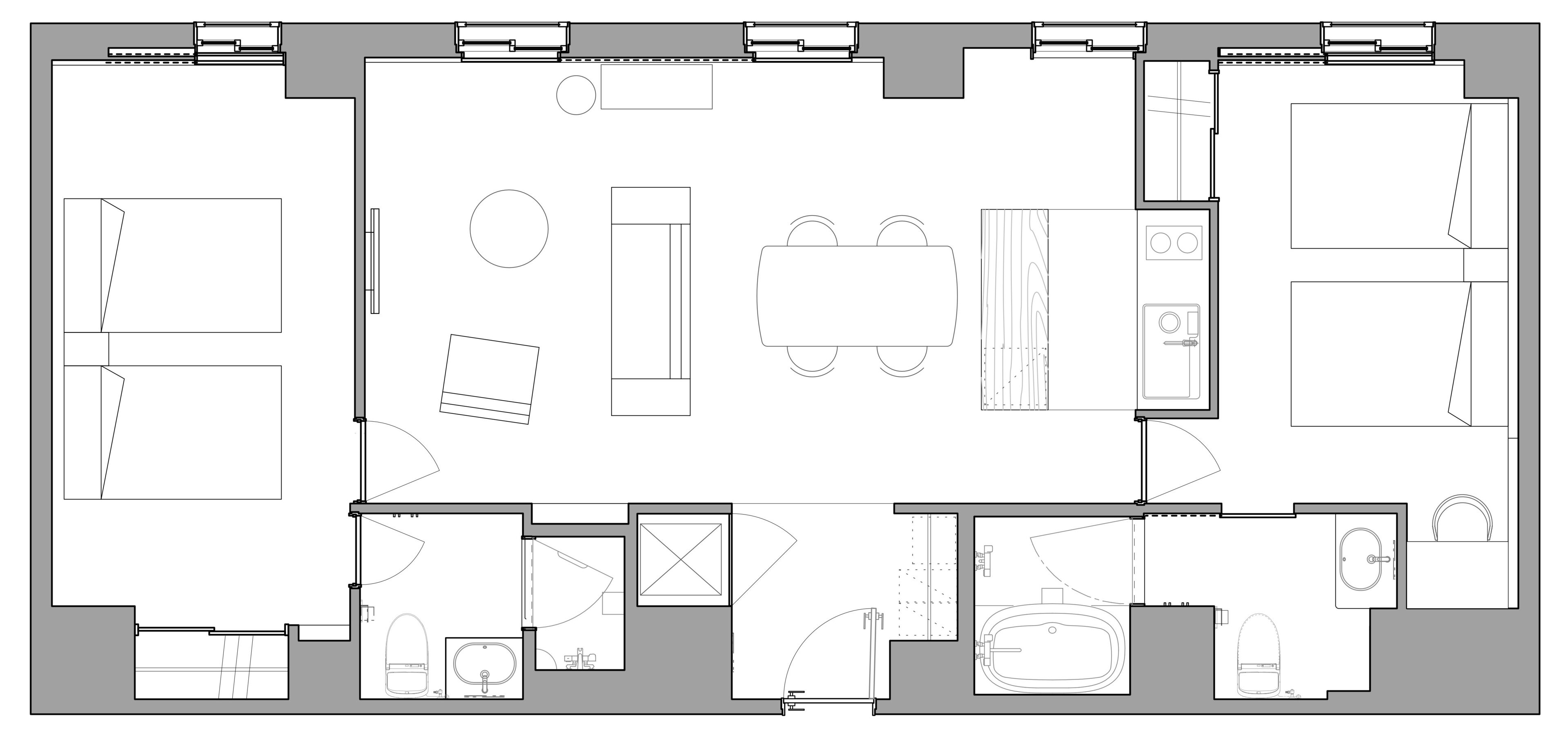 A floor plan of a hotel with multiple rooms, including a kitchen, dining area, and bathrooms.