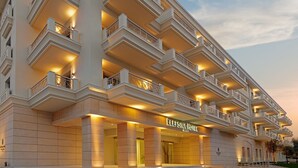 A multi-story hotel with balconies, a prominent entrance, and a sign reading "ELLEFSINA HOTEL". - Elefsina Hotel (Elefsina)