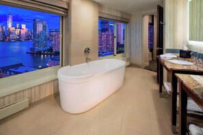 Combined shower/tub, designer toiletries, hair dryer, bathrobes