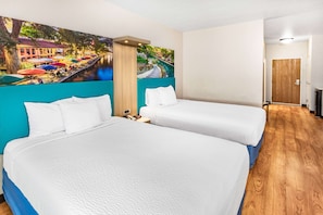Suite, 2 Bedrooms, Non Smoking (1 King & 2 Queen Beds) | Pillowtop beds, desk, blackout drapes, iron/ironing board