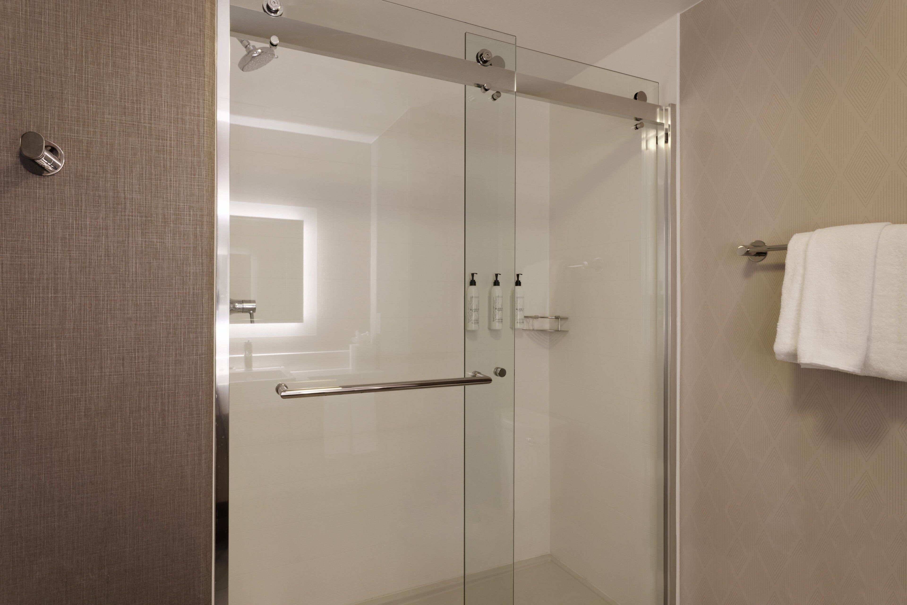 combined shower/bathtub, free toiletries, hair dryer, towels