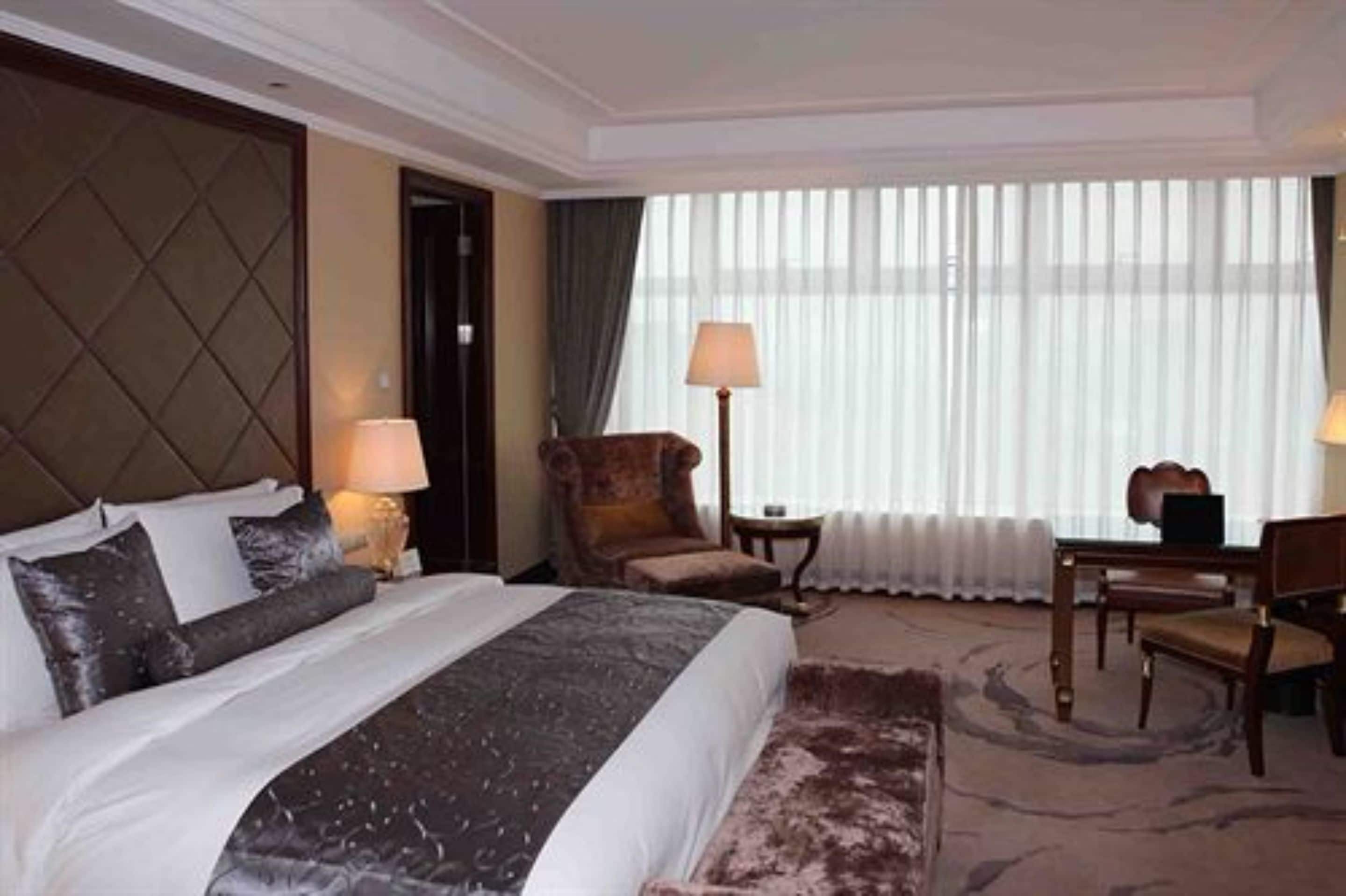 business suite | minibar, in-room safe, desk, iron/ironing board