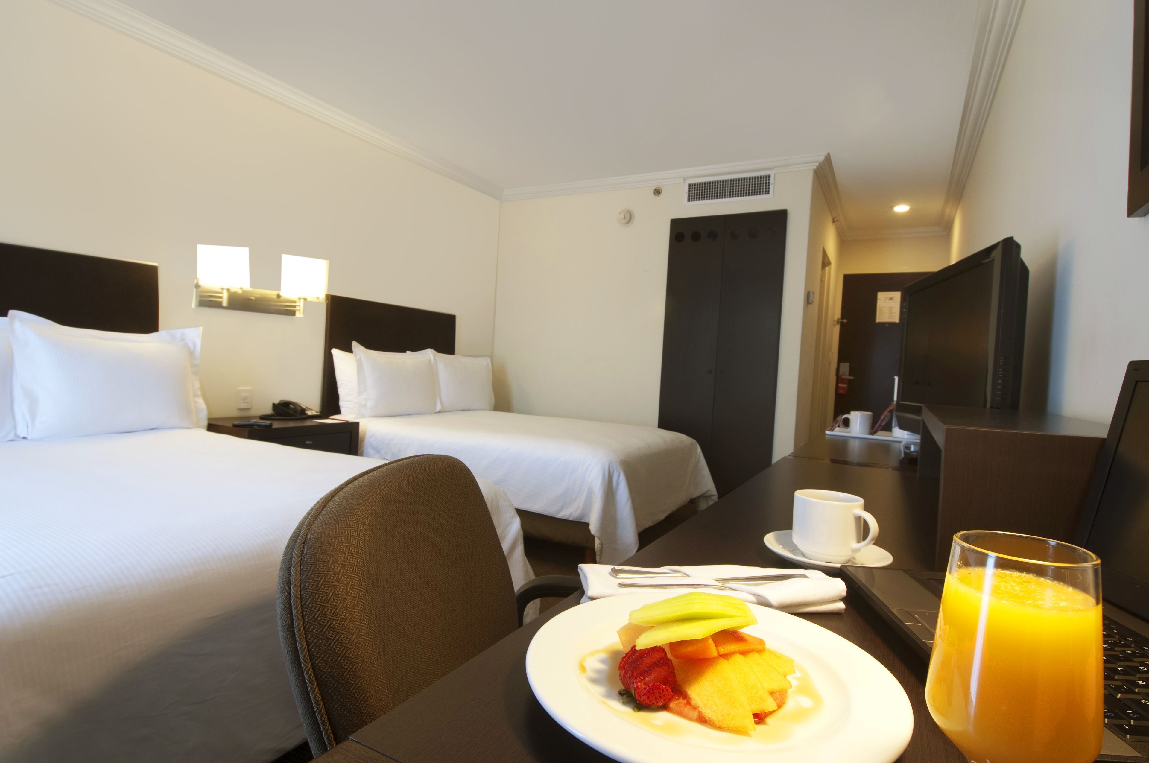 Down duvets, pillow-top beds, in-room safe, desk