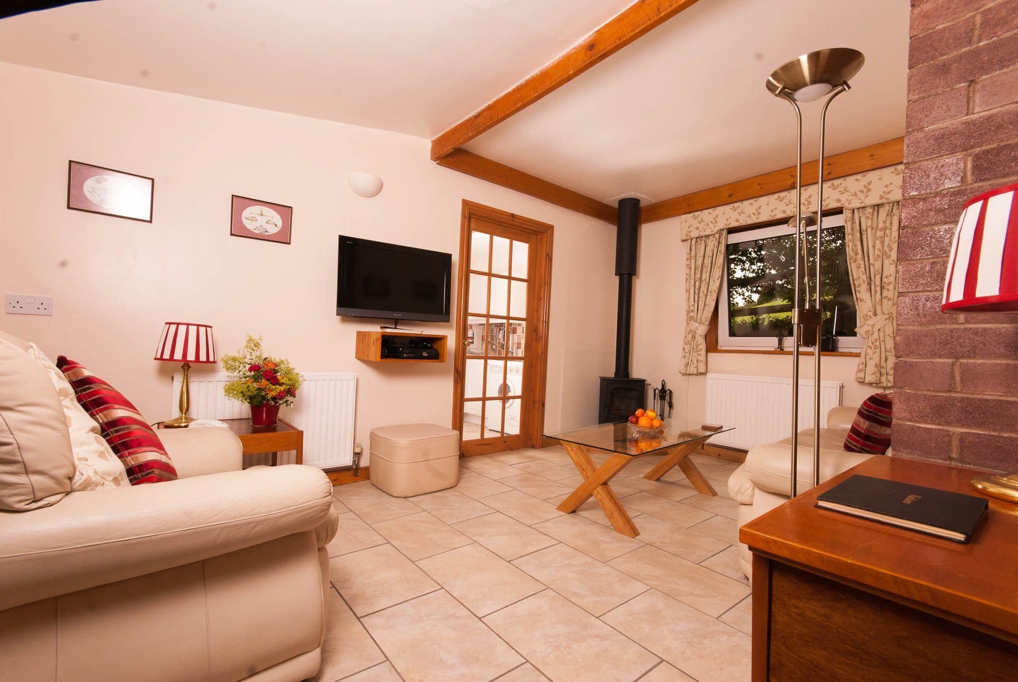 Cottage, 2 Bedrooms (Mendip Magic) | Living room | Flat-screen TV, fireplace, DVD player