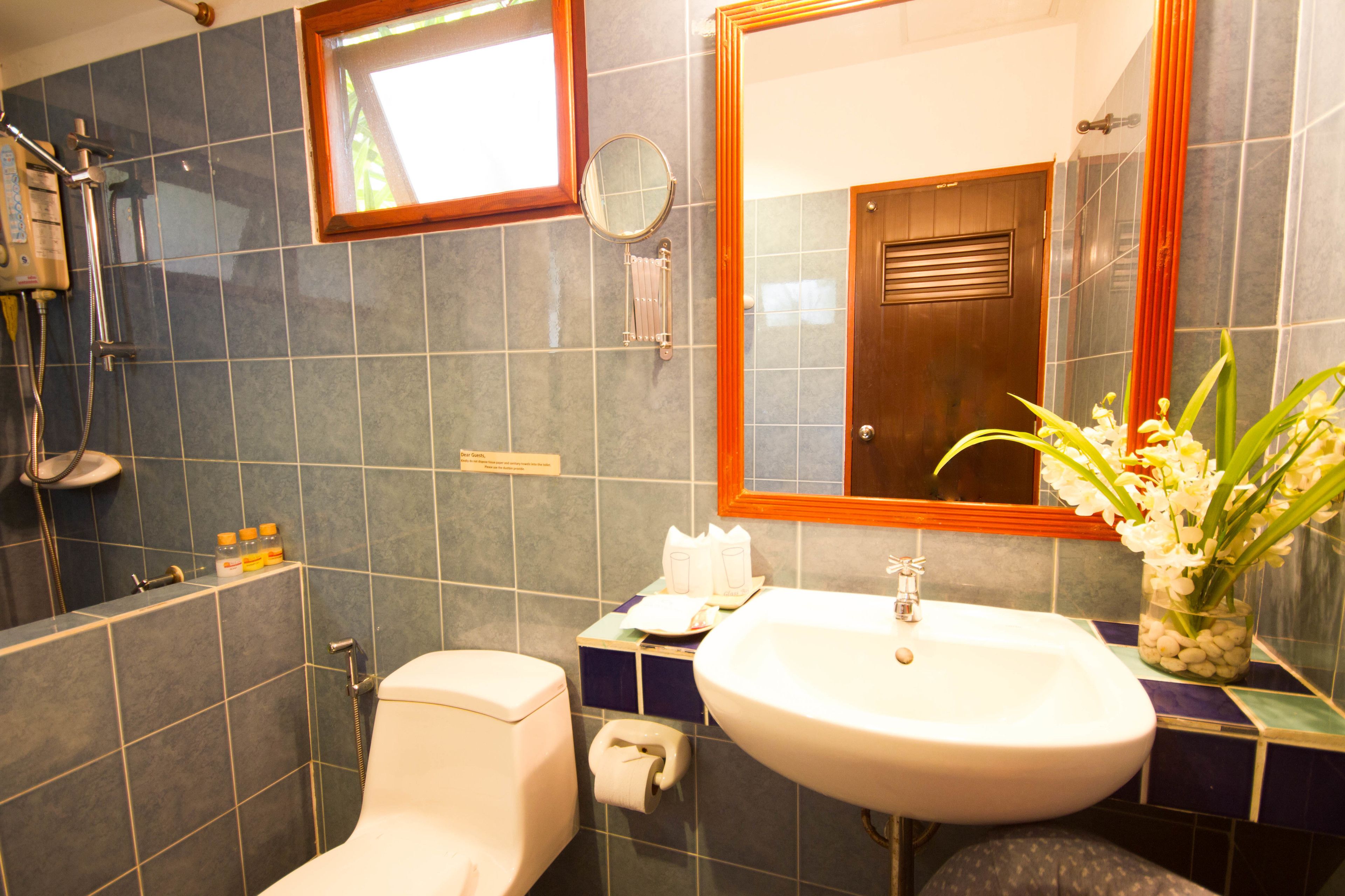 superior bungalow | bathroom | hair dryer, towels