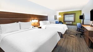 A hotel room with two beds, a desk, a chair, a TV, and a window with a view. - Holiday Inn Express Hotel & Suites Ozona by IHG (Ozona)