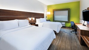 A hotel room with two beds, a desk, a chair, a TV, and a large window. - Holiday Inn Express Hotel & Suites Ozona by IHG (Ozona)