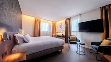 Suite, 1 King Bed with Sofa bed | In-room safe, desk, soundproofing, iron/ironing board
