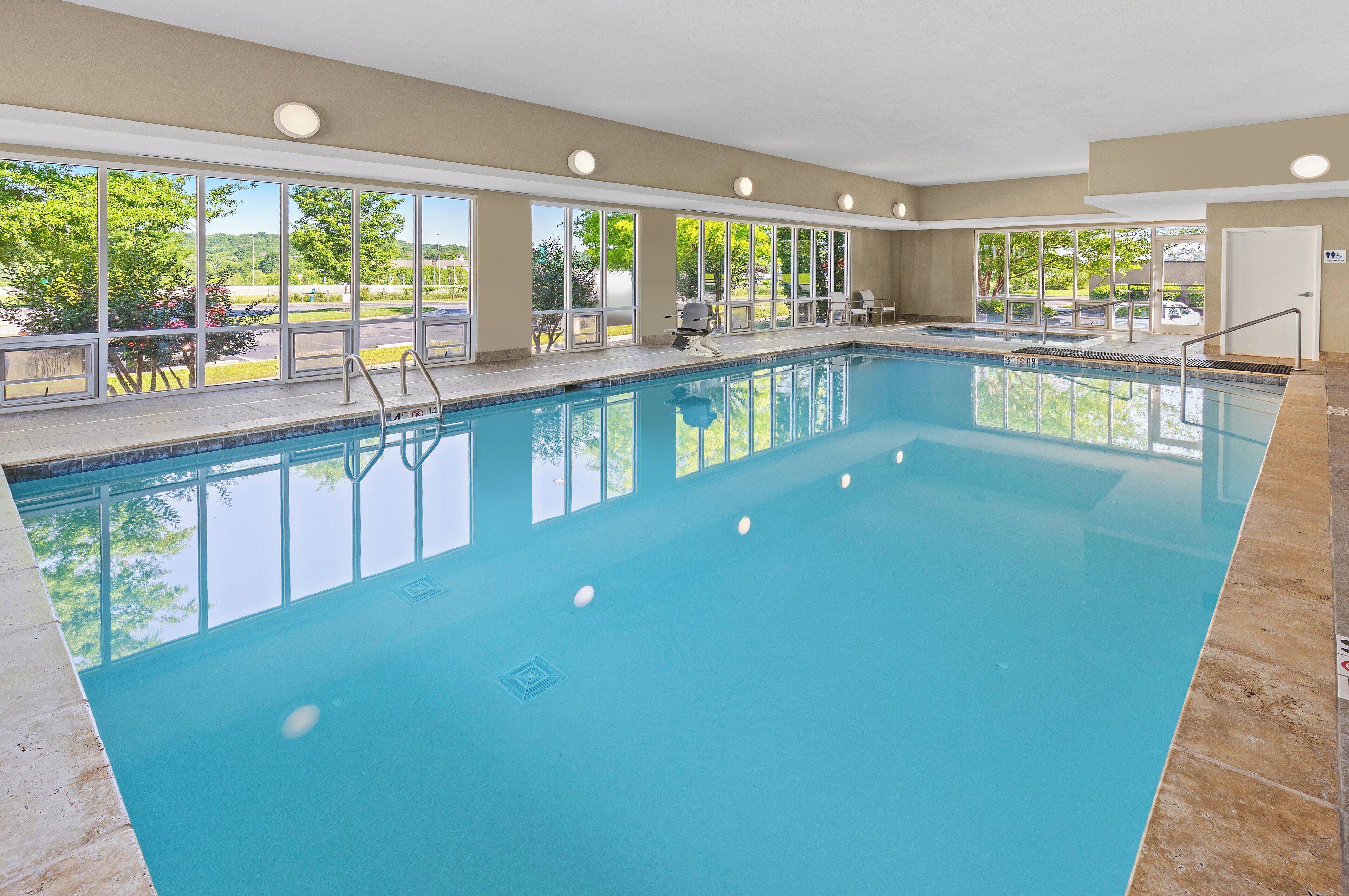 indoor pool, open 8 am to 10:00 pm, pool loungers