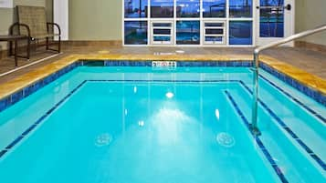 Indoor pool, open 8 AM to 10:00 PM, pool loungers