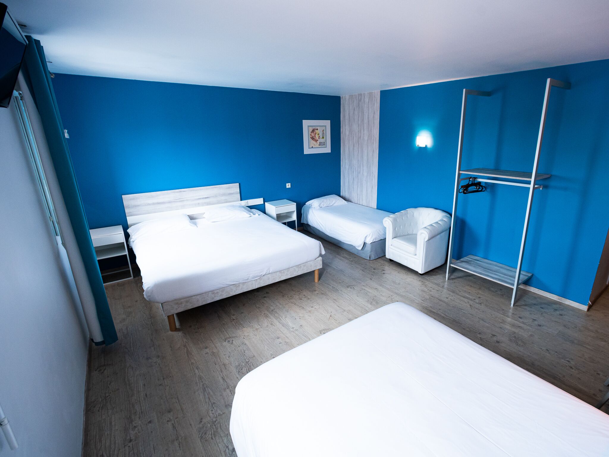 family room | premium bedding, individually decorated, desk, blackout curtains